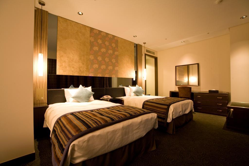 Okinawa Kariyushi Urban Resort Naha Rum bild